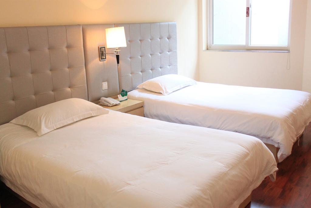 Qingdao Renjia Bussiness Hotel Bilik gambar